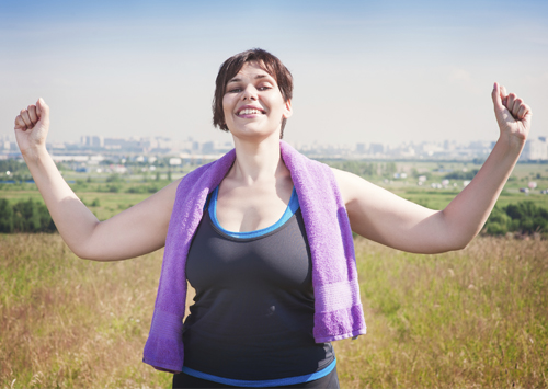 Woman exercising and learning how to get fit in 30 days