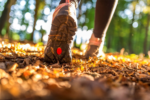 woman hiking a San Antonio trail in Fall