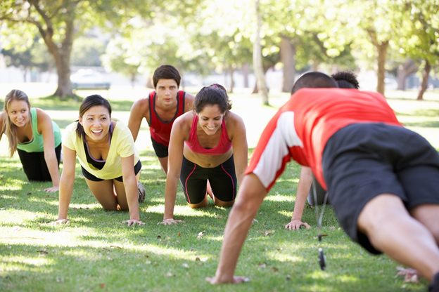 Group of people working out in the park